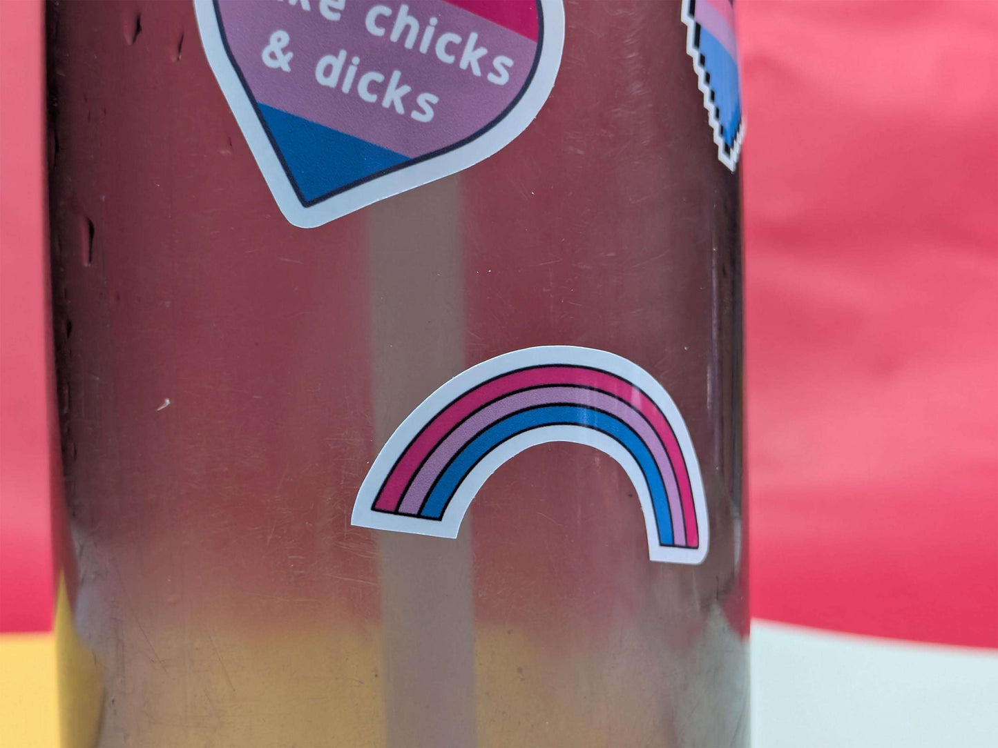 Bottle with rainbow design