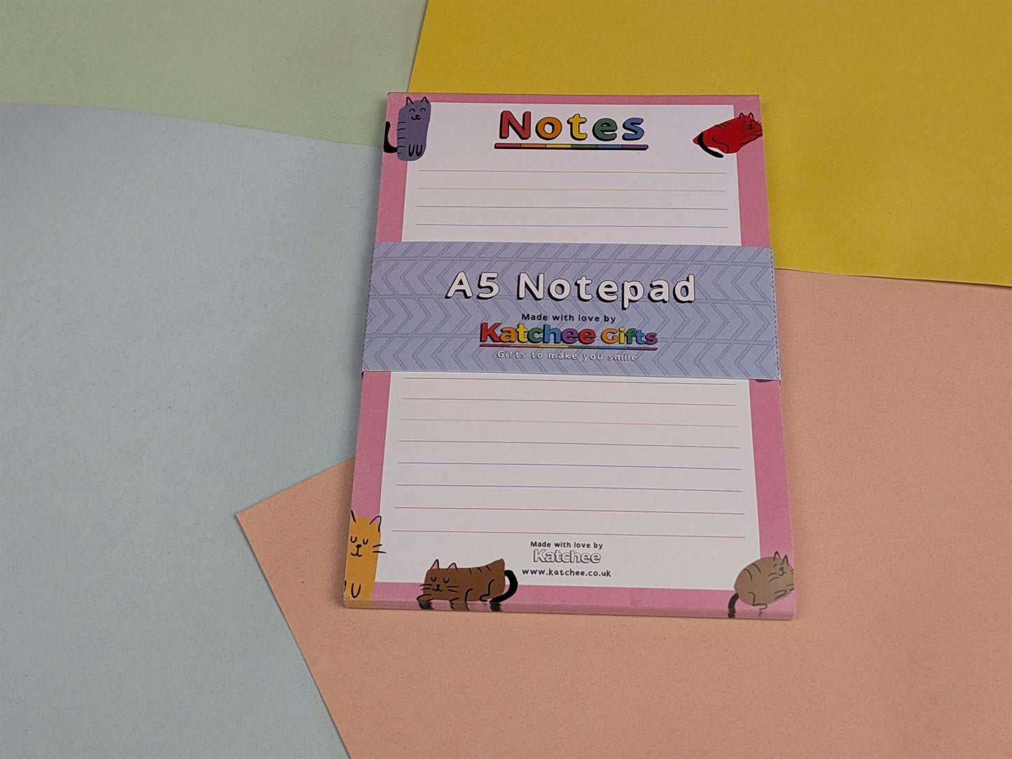 A5 notepad with colorful design on a multicolored background