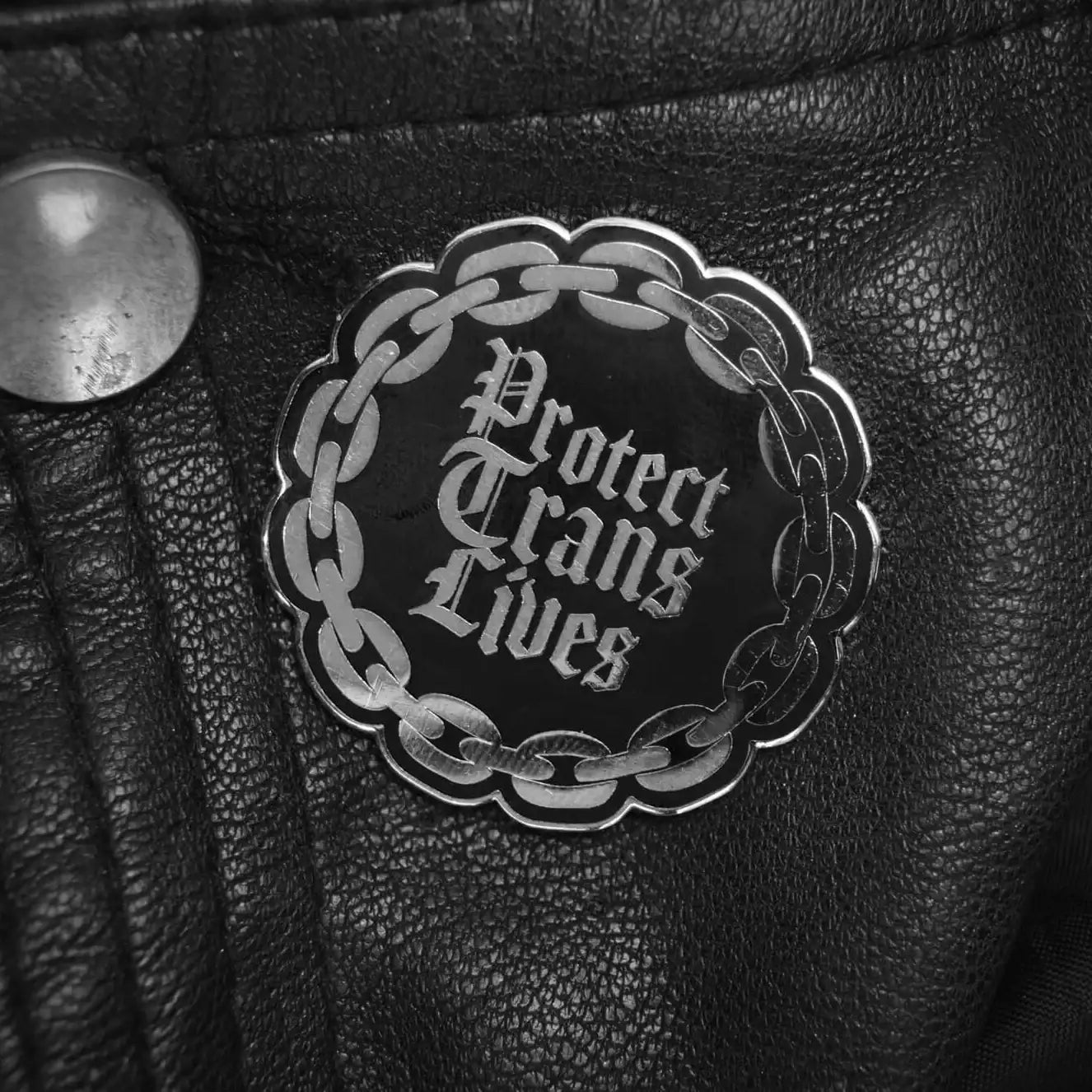 Protect trans lives gothic enamel pin