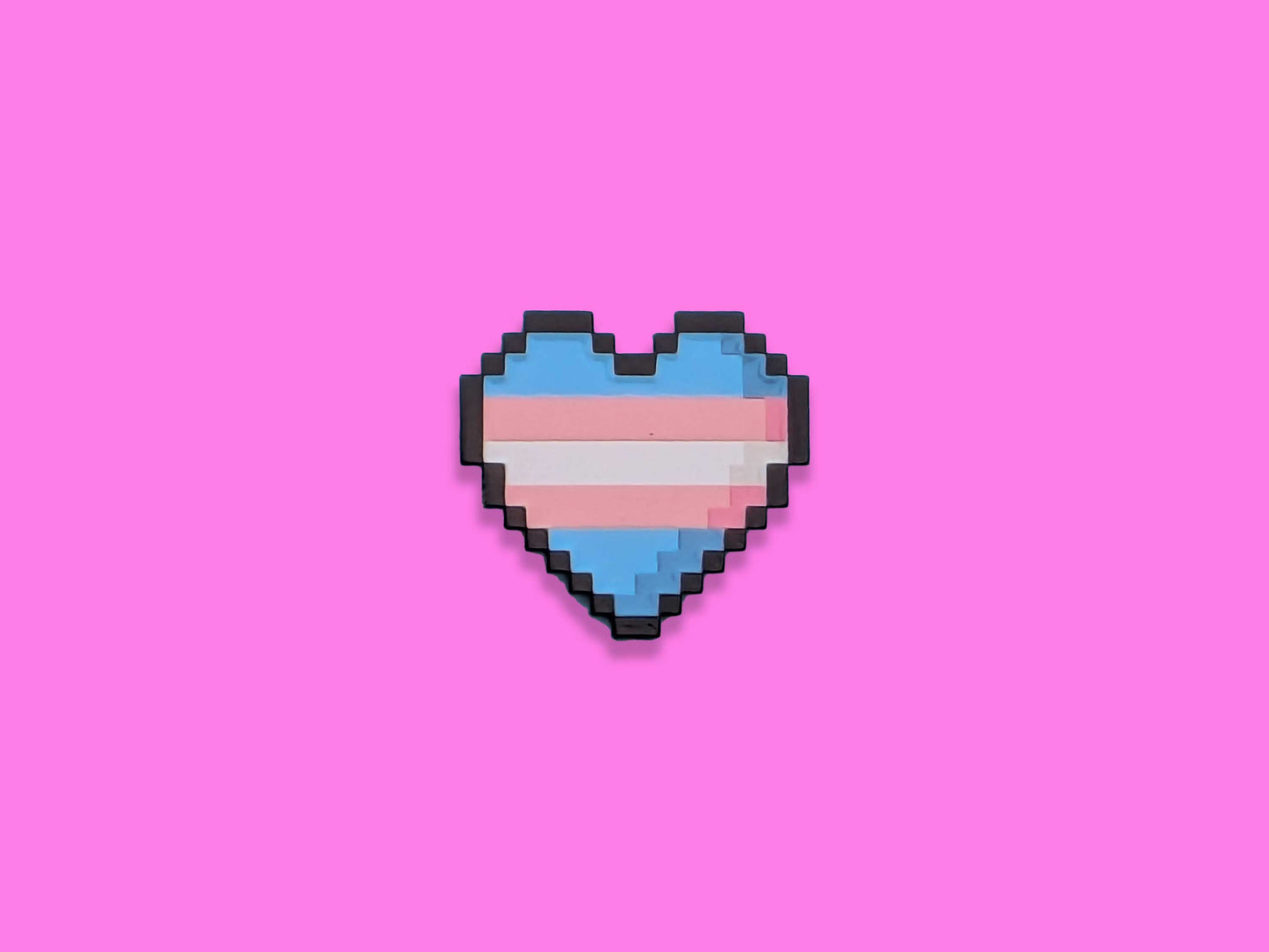 Pixelated heart-shaped transgender flag on a pink background