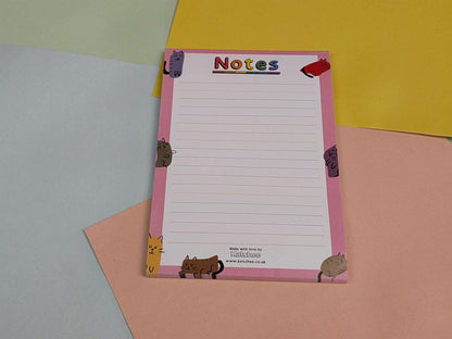 Notepad with animal illustrations on a colorful background