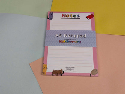 A5 notepad with colorful design on a multicolored background