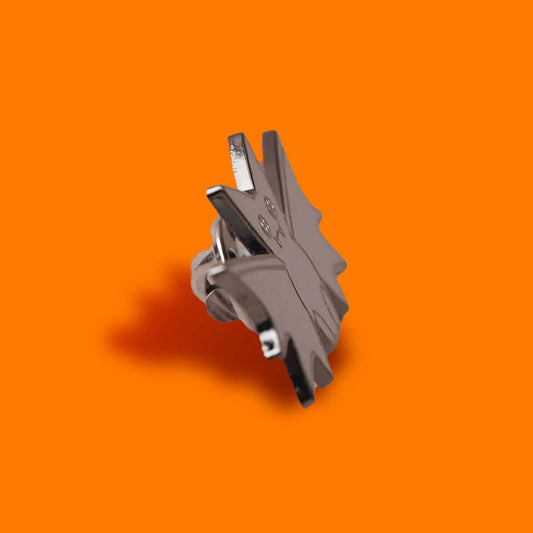 Metal clip on an orange background