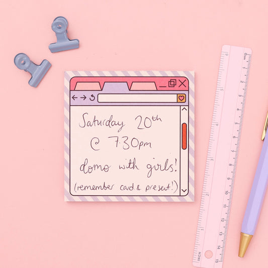 Note with event details on a pink background with stationery items