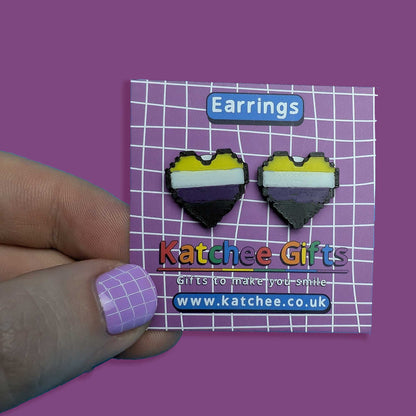 Heart-shaped earrings on a Katchee Gifts packaging with a purple background