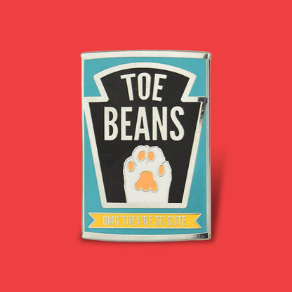 Pin with 'Toe Beans' design on a red background
