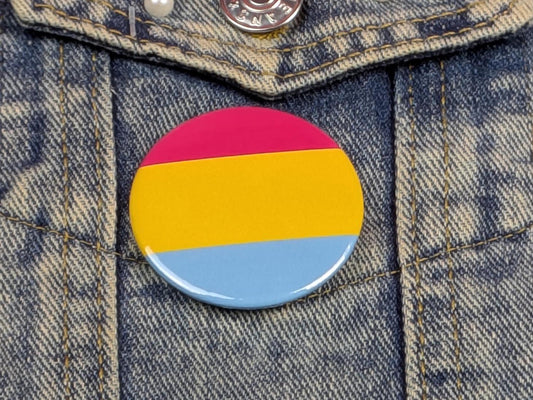 Pansexual flag button badge on a denim jacket