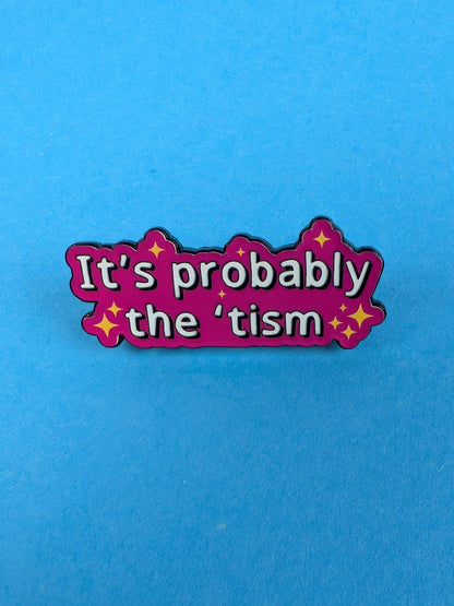 pin with 'It's probably the 'tism' text on a blue background