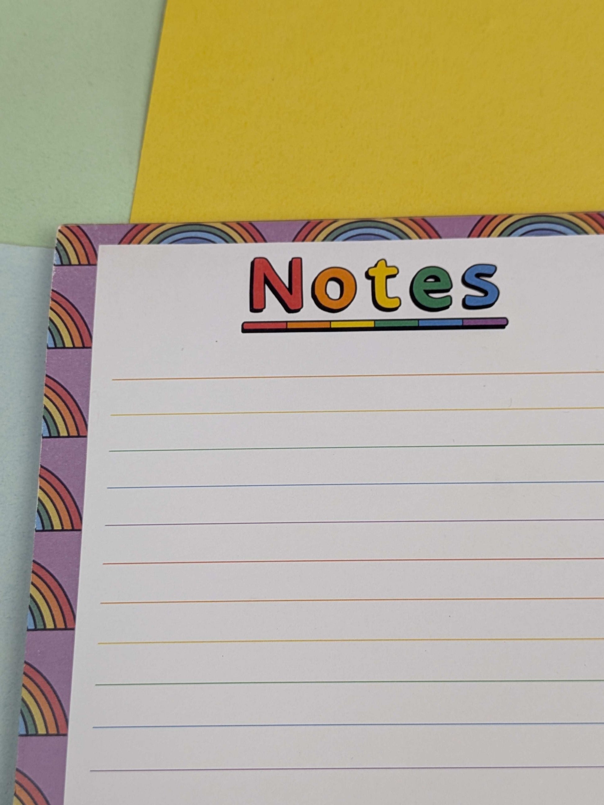 Notepad with colorful rainbow border and 'Notes' text on a multicolored background
