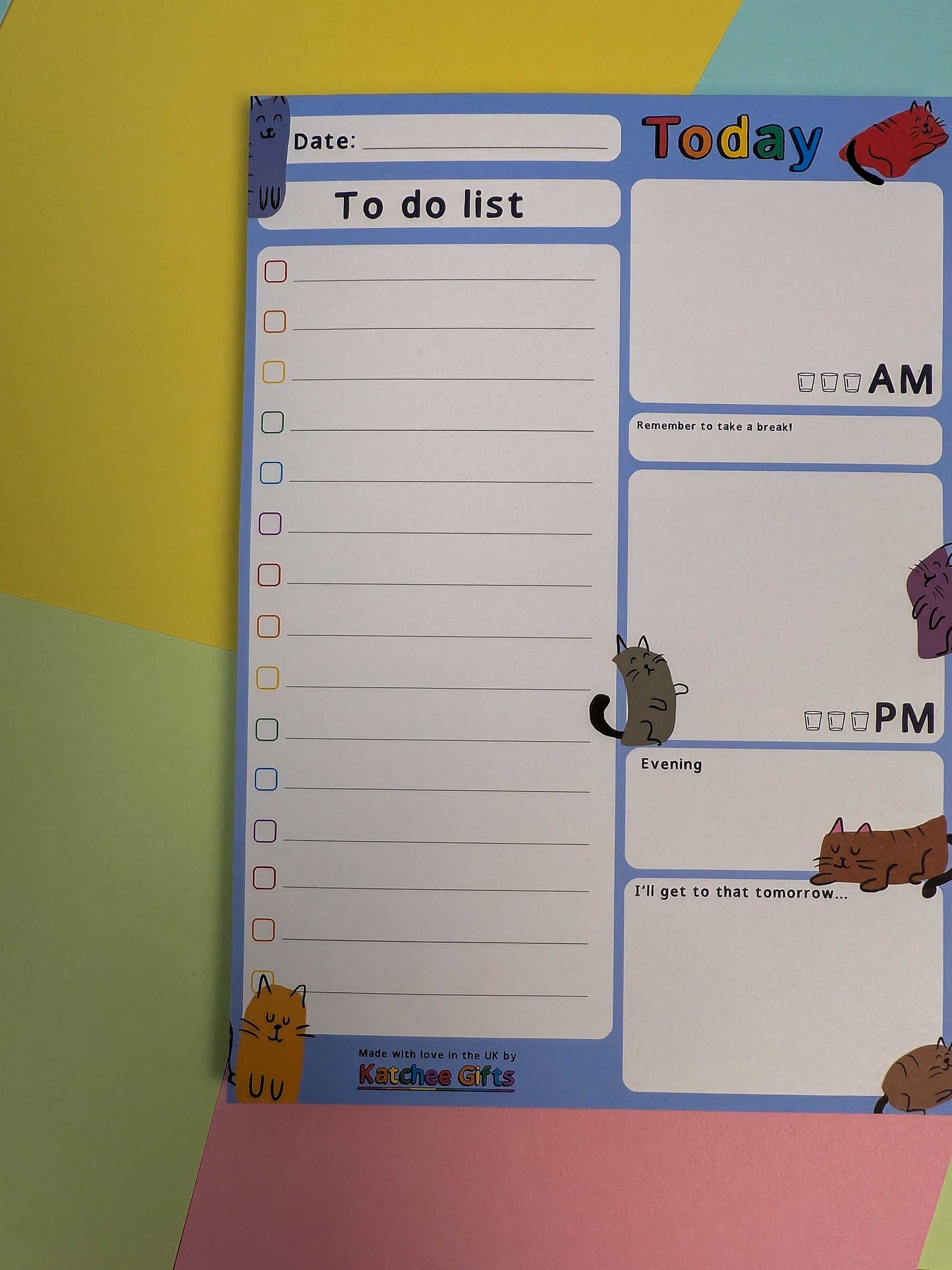To-do list pad with cartoon animals on a colorful background