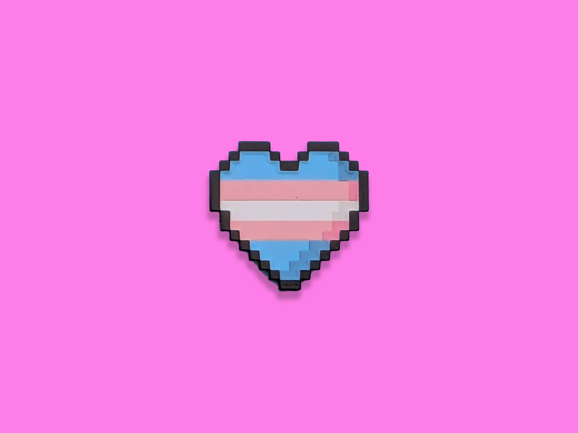 Pixelated heart-shaped transgender flag on a pink background